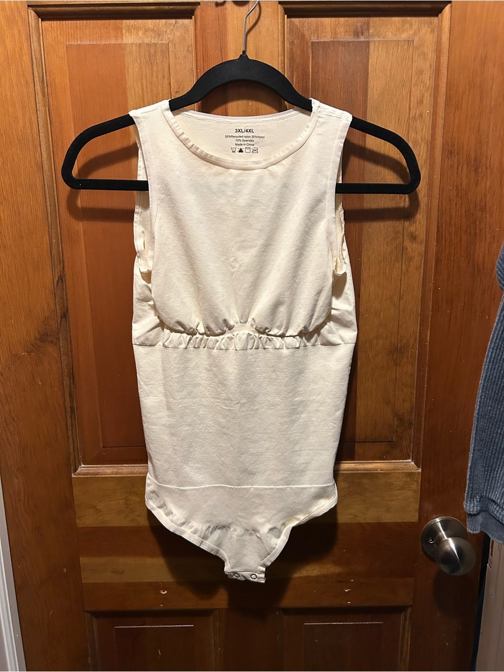 Cream Sleeveless Bodysuit
